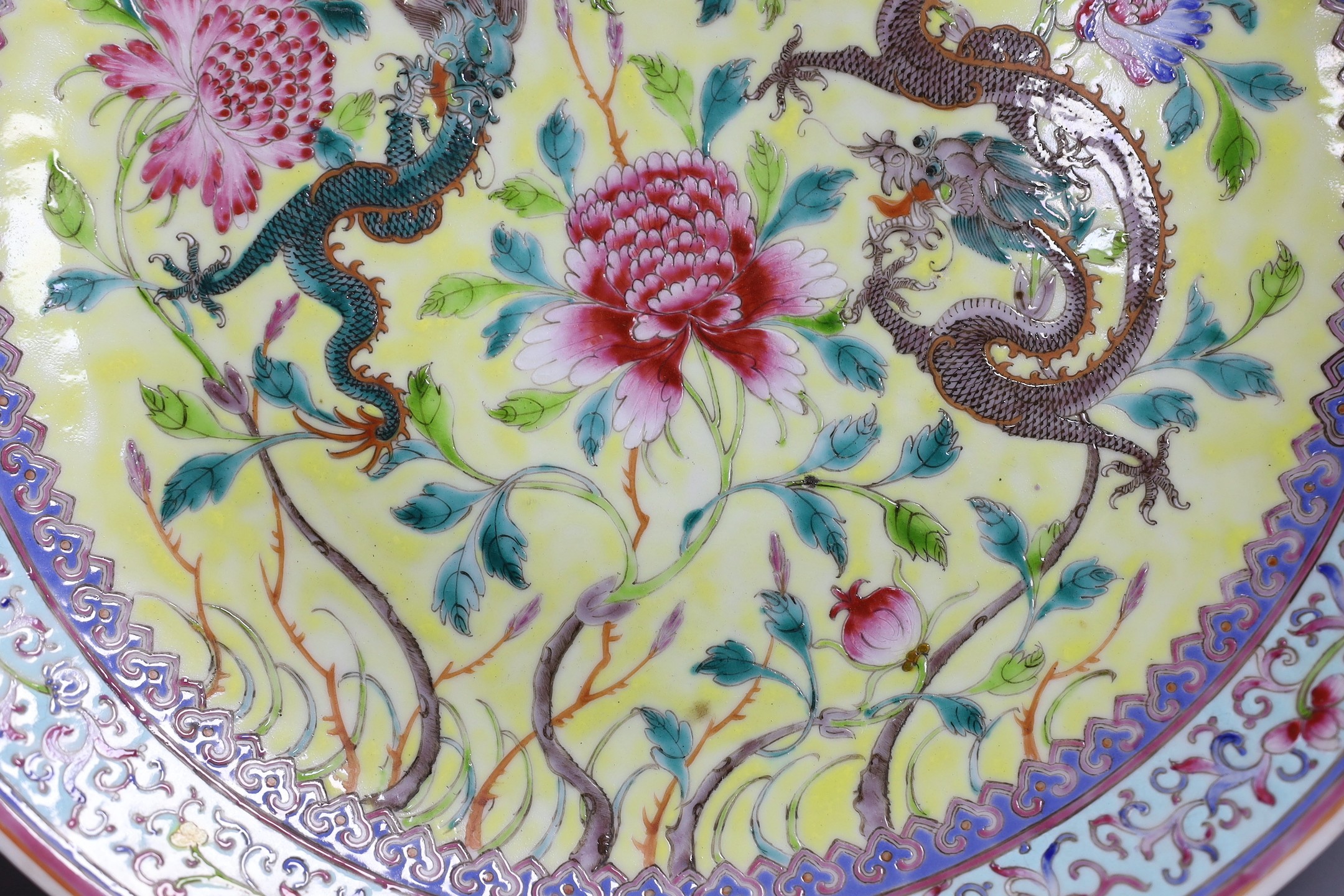 A Chinese yellow ground ‘dragon’ dish, Qianlong mark but Republic period, 34 cms diameter.